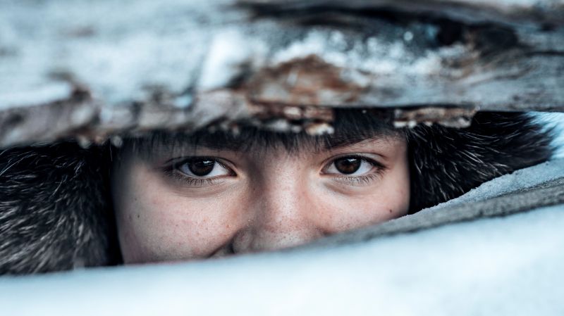 Nærfoto av et samisk ansikt. Foto: Mediastorm